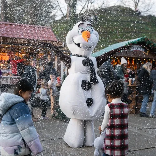 A child meeting a character from Frosty Tales