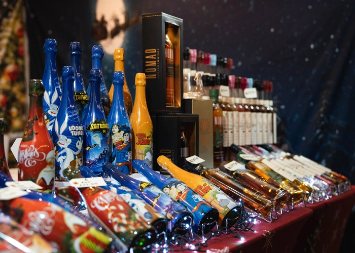 Fudge stall lit up with festive lights at the Market Village
